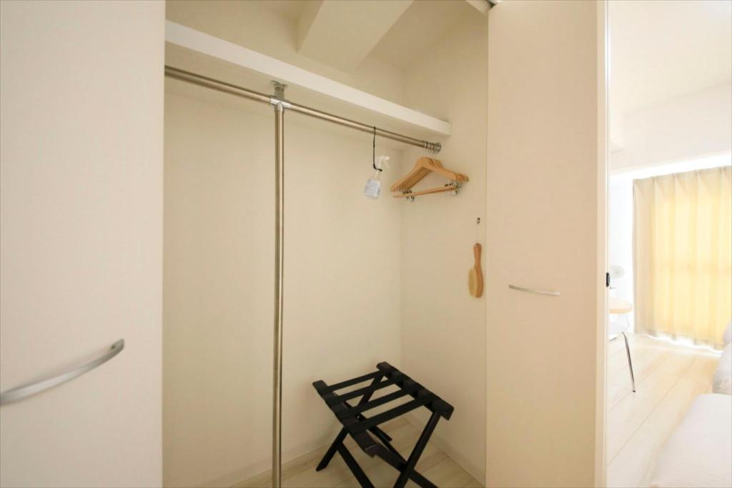 Postel nebo postele na pokoji v ubytování Bay Hotel Urayasu-ekimae