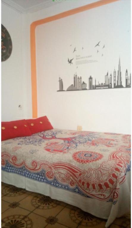 A bed or beds in a room at Apartamento Lulu