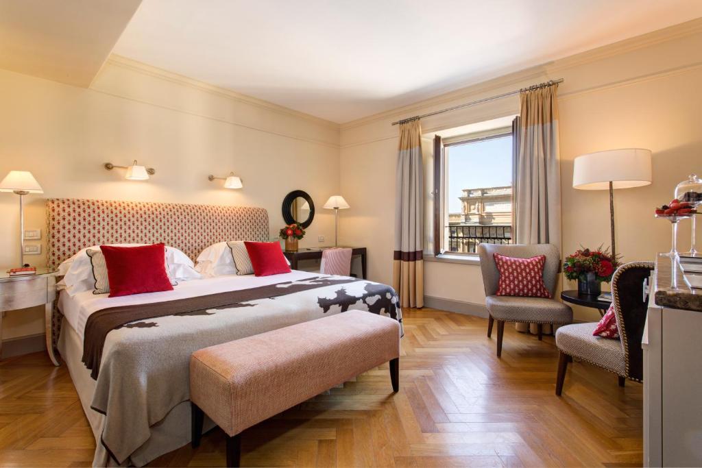 Postel nebo postele na pokoji v ubytování Rocco Forte Hotel Savoy