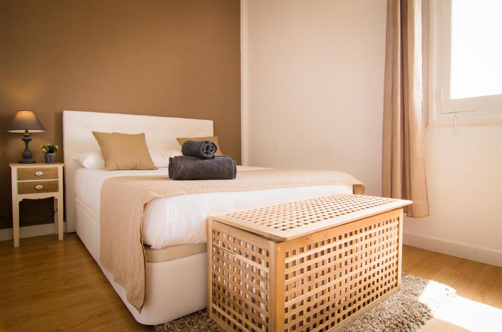 Posteľ alebo postele v izbe v ubytovaní Holidays2Malaga Terraza & junto puerto deportivo