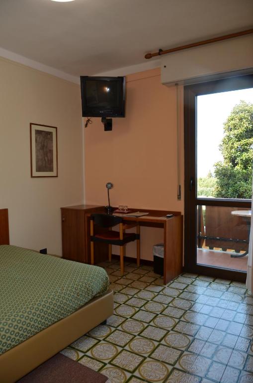 TV a/nebo společenská místnost v ubytování Parc Hotel Casa Mia