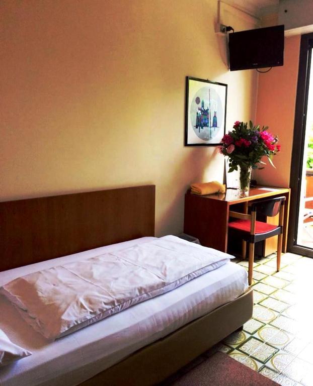 Postel nebo postele na pokoji v ubytování Parc Hotel Casa Mia