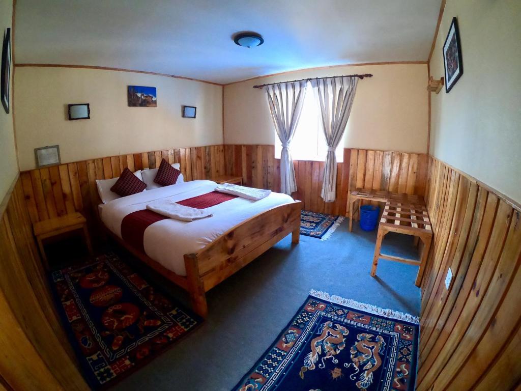 Postel nebo postele na pokoji v ubytování Panorama Lodge and Restaurant