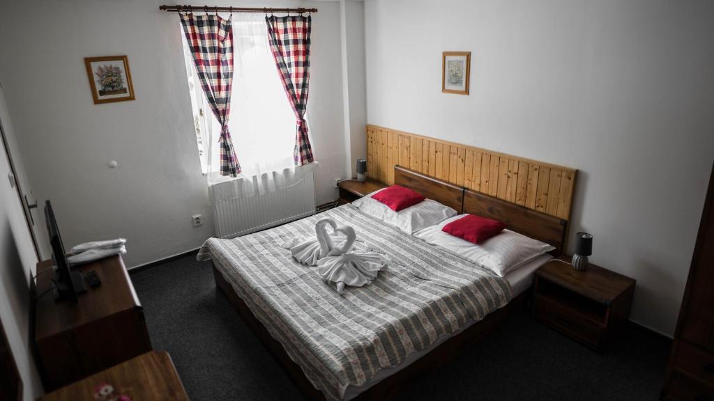 Postel nebo postele na pokoji v ubytování Hotel Atlas