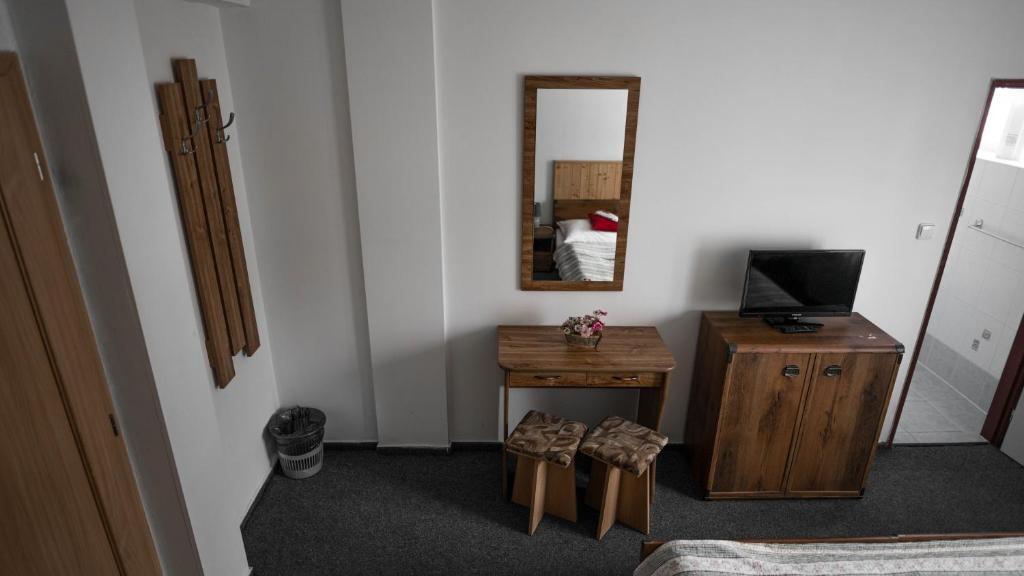TV a/nebo společenská místnost v ubytování Hotel Atlas