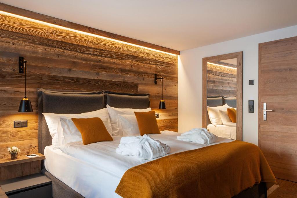 Postel nebo postele na pokoji v ubytování 22 Summits Boutique Hotel