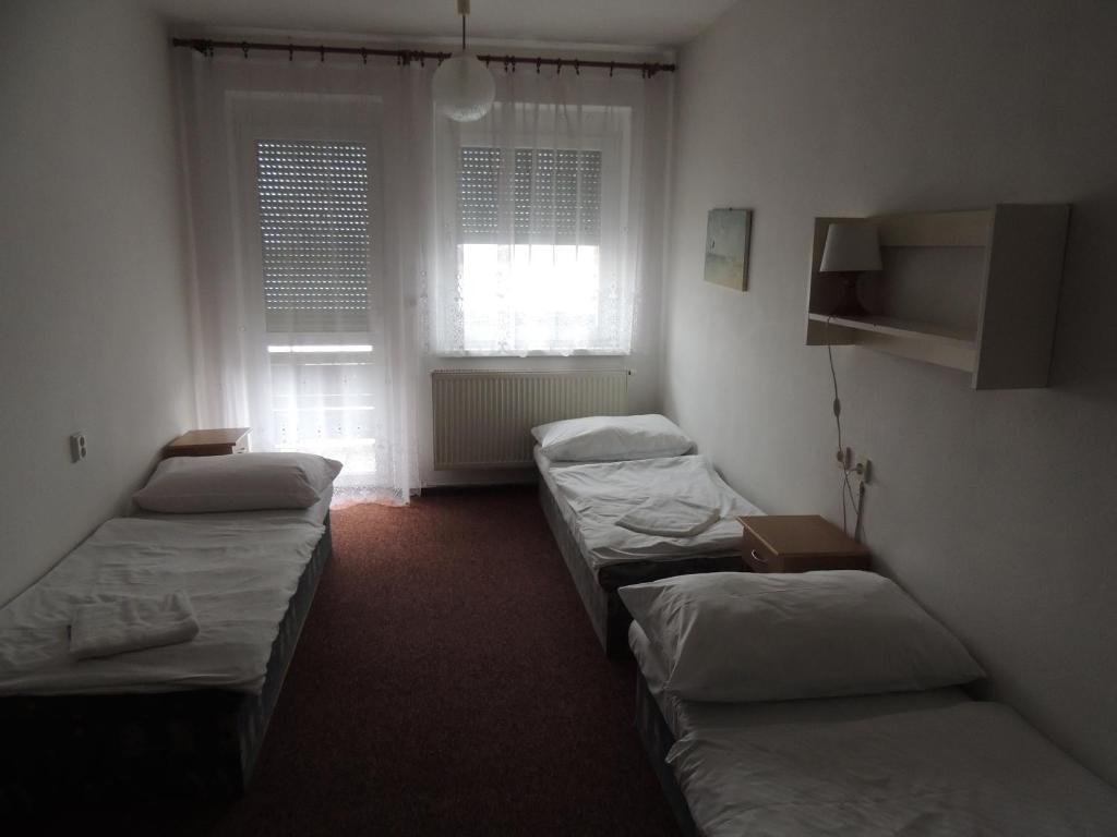 Postel nebo postele na pokoji v ubytování Chata Triomint