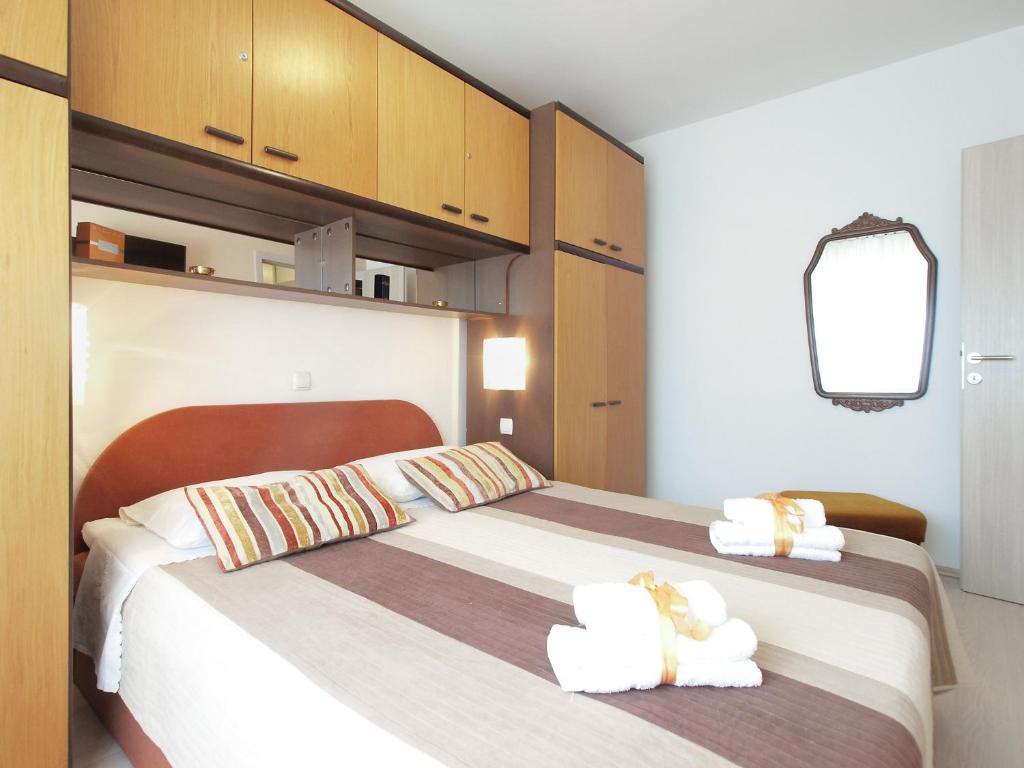 Łóżko lub łóżka w pokoju w obiekcie Holiday Home Villa Angelina 1233