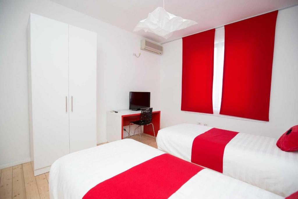 Postel nebo postele na pokoji v ubytování Hotel Rimini Tirana