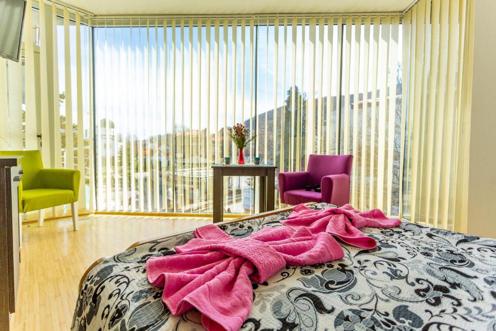 Letto o letti in una camera di Guesthouse Sunny