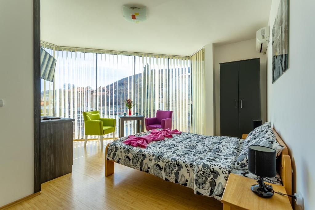 Letto o letti in una camera di Guesthouse Sunny
