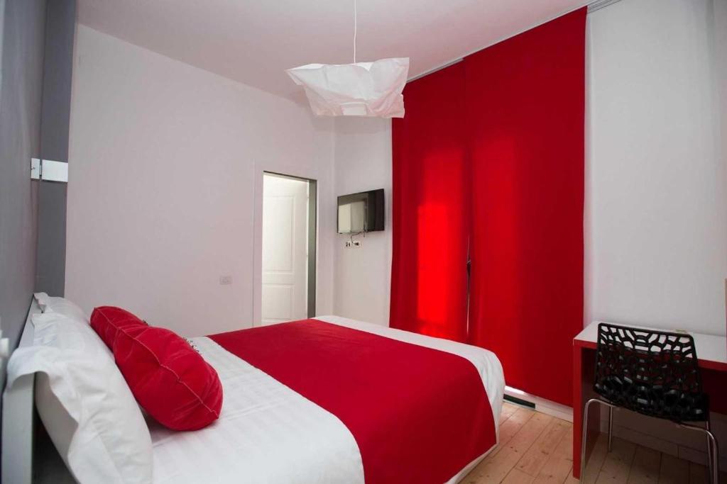 Postel nebo postele na pokoji v ubytování Hotel Rimini Tirana