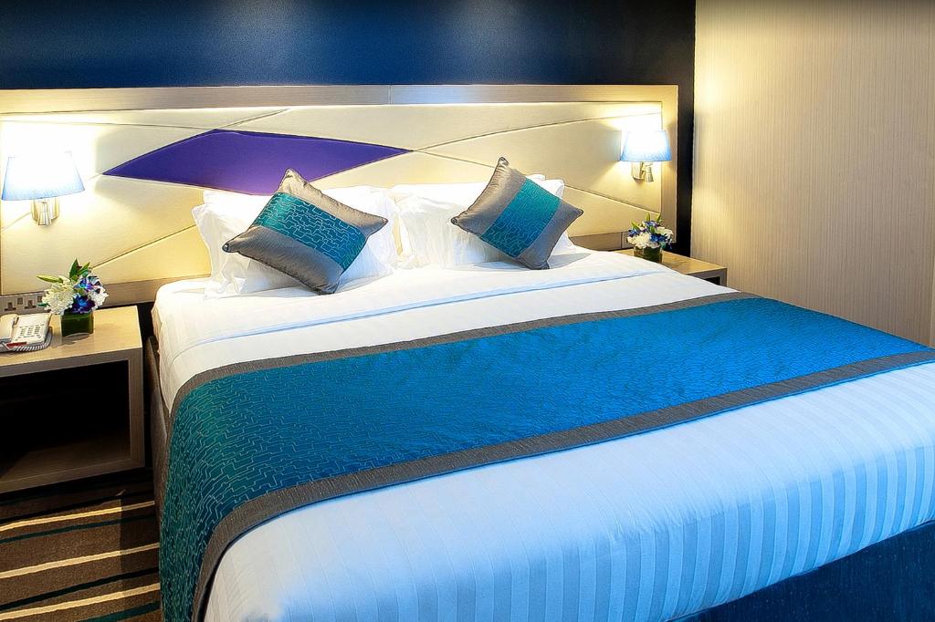 Postel nebo postele na pokoji v ubytování Al Sarab Hotel
