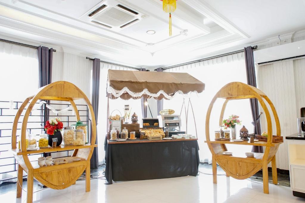 Posezení v ubytování Adhiwangsa Hotel