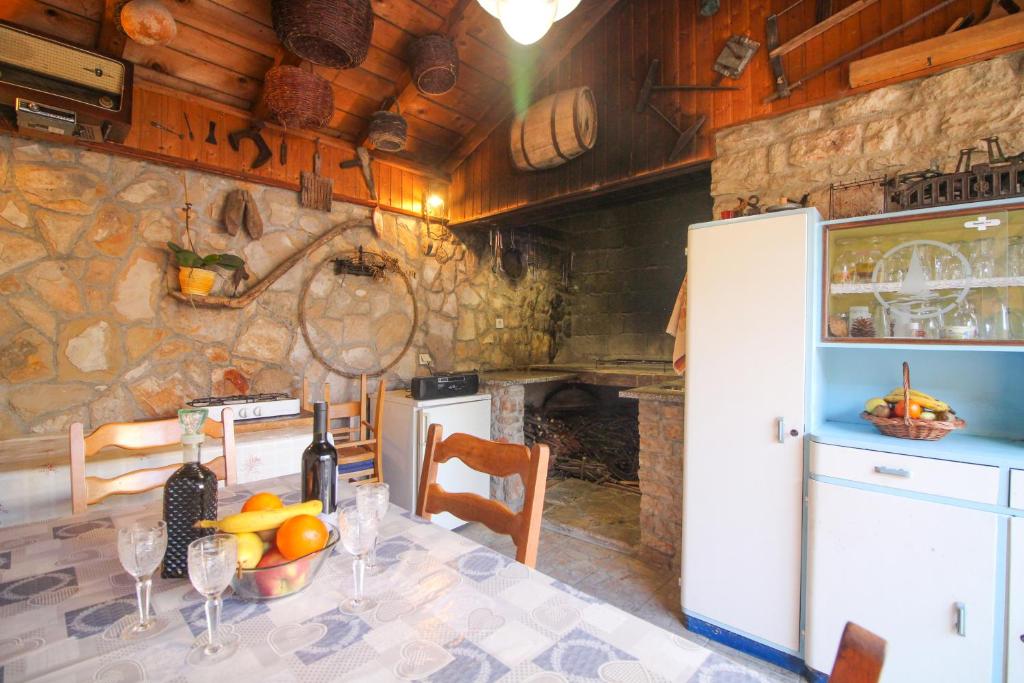 Kuchyňa alebo kuchynka v ubytovaní Apartman Matošin