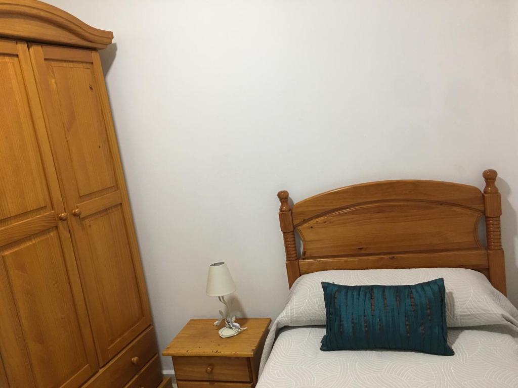 Postel nebo postele na pokoji v ubytování Hostal Gutierrez