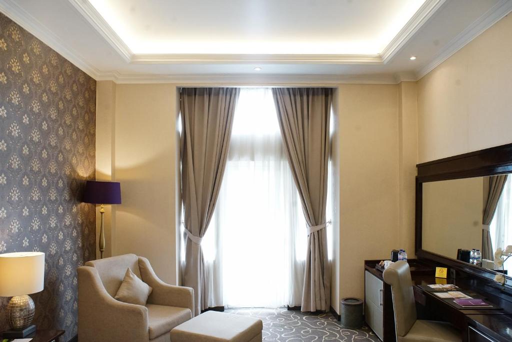 Posezení v ubytování Adhiwangsa Hotel
