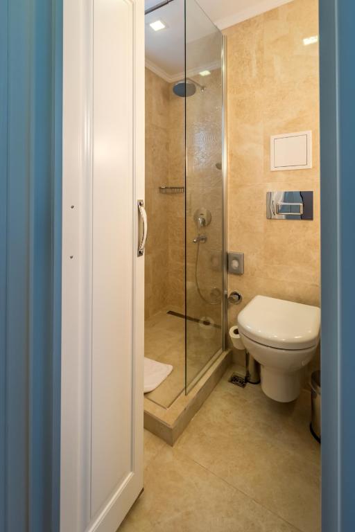Koupelna v ubytování Hotel Arpezos