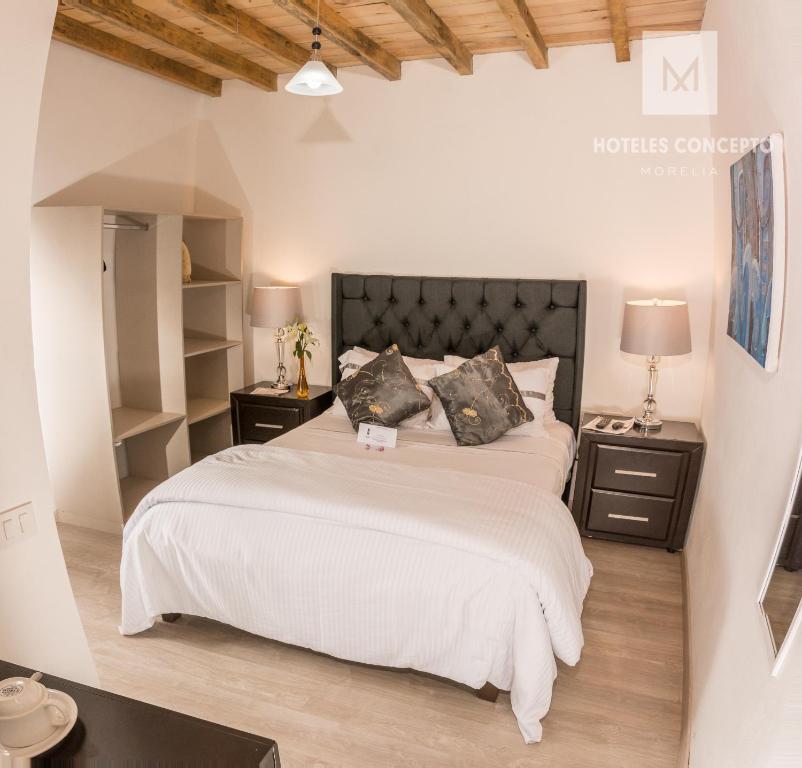 Postel nebo postele na pokoji v ubytování M Hoteles Concepto