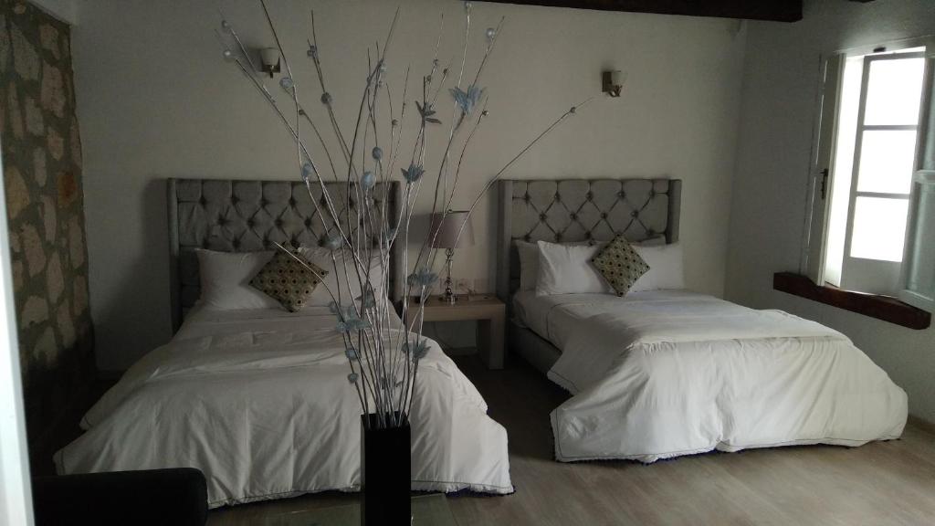 Postel nebo postele na pokoji v ubytování M Hoteles Concepto
