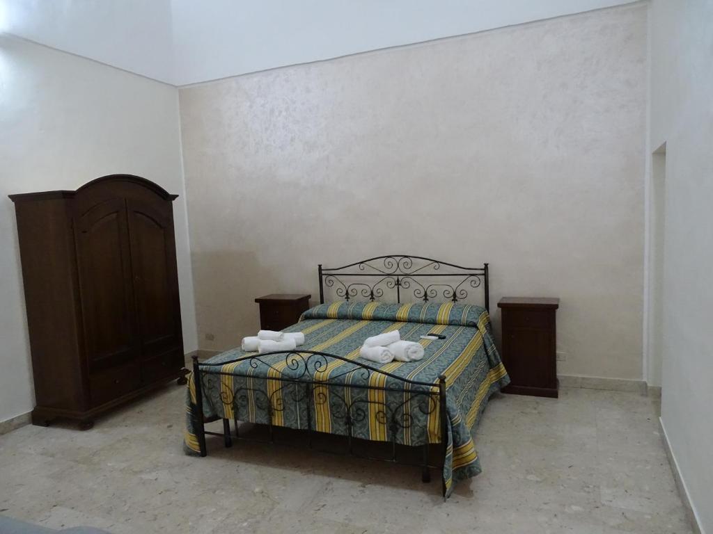 Postel nebo postele na pokoji v ubytování b&b new antico palazzo