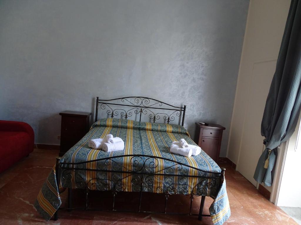 Postel nebo postele na pokoji v ubytování b&b new antico palazzo