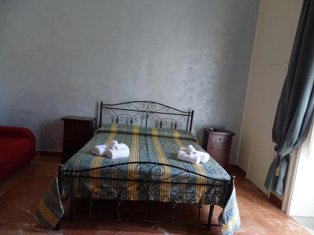 Postel nebo postele na pokoji v ubytování b&b new antico palazzo