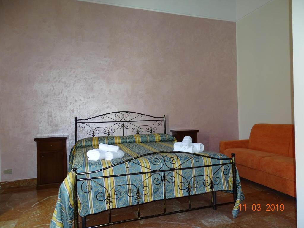 Postel nebo postele na pokoji v ubytování b&b new antico palazzo