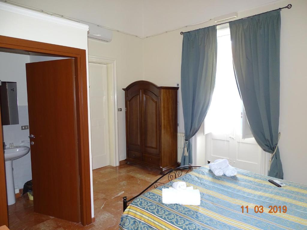 Postel nebo postele na pokoji v ubytování b&b new antico palazzo