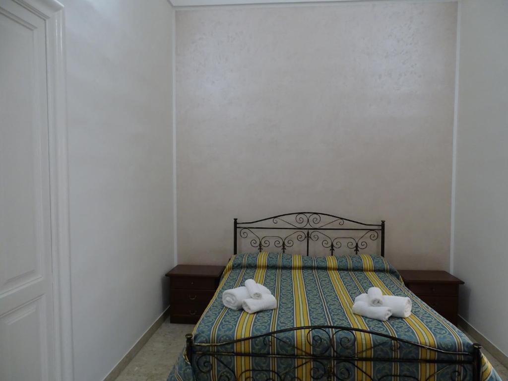 Postel nebo postele na pokoji v ubytování b&b new antico palazzo