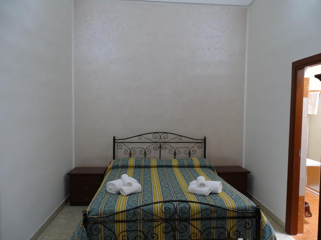 Postel nebo postele na pokoji v ubytování b&b new antico palazzo