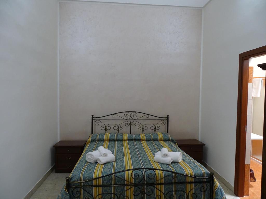 Postel nebo postele na pokoji v ubytování b&b new antico palazzo