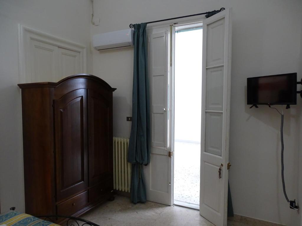 TV a/nebo společenská místnost v ubytování b&b new antico palazzo