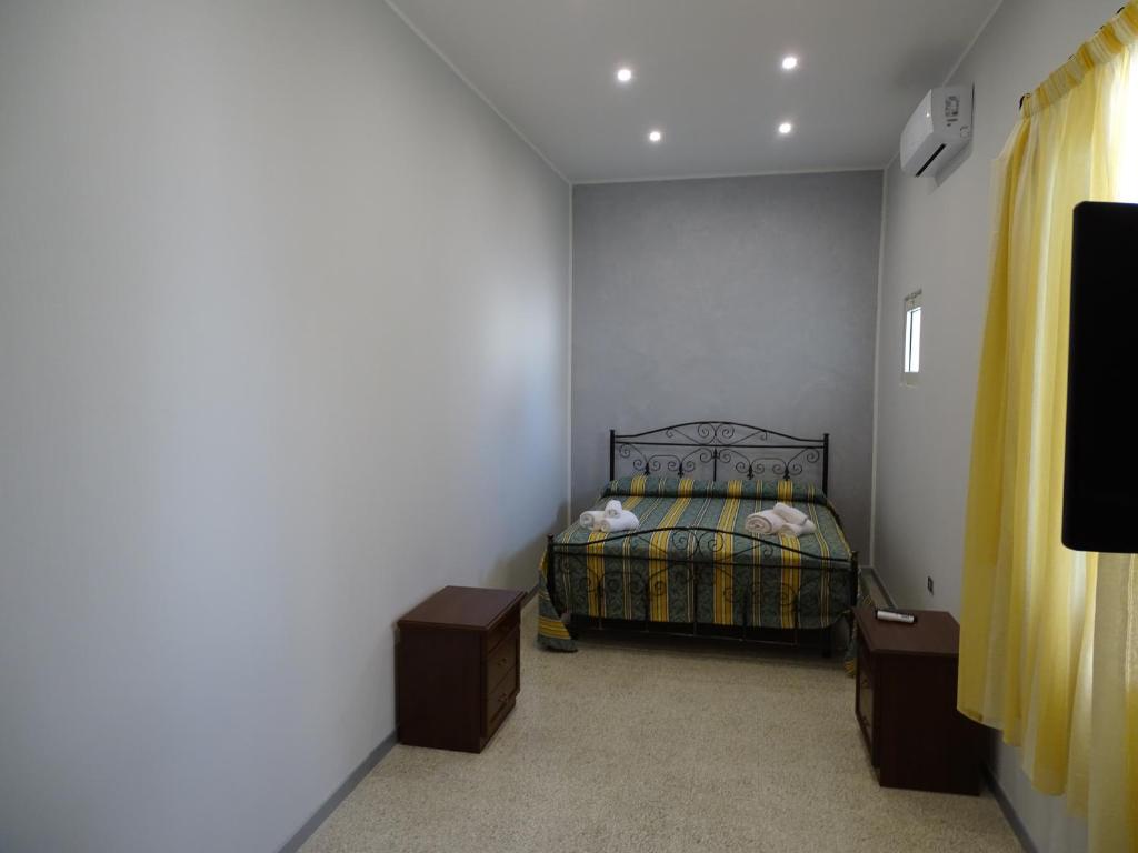 Postel nebo postele na pokoji v ubytování b&b new antico palazzo