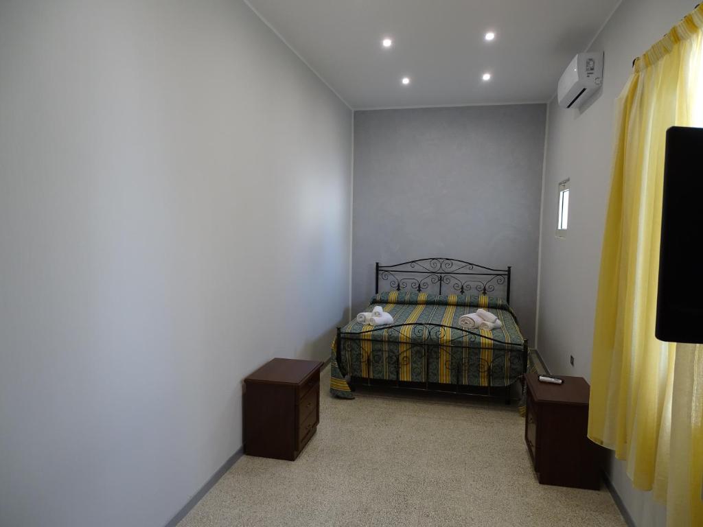 Postel nebo postele na pokoji v ubytování b&b new antico palazzo