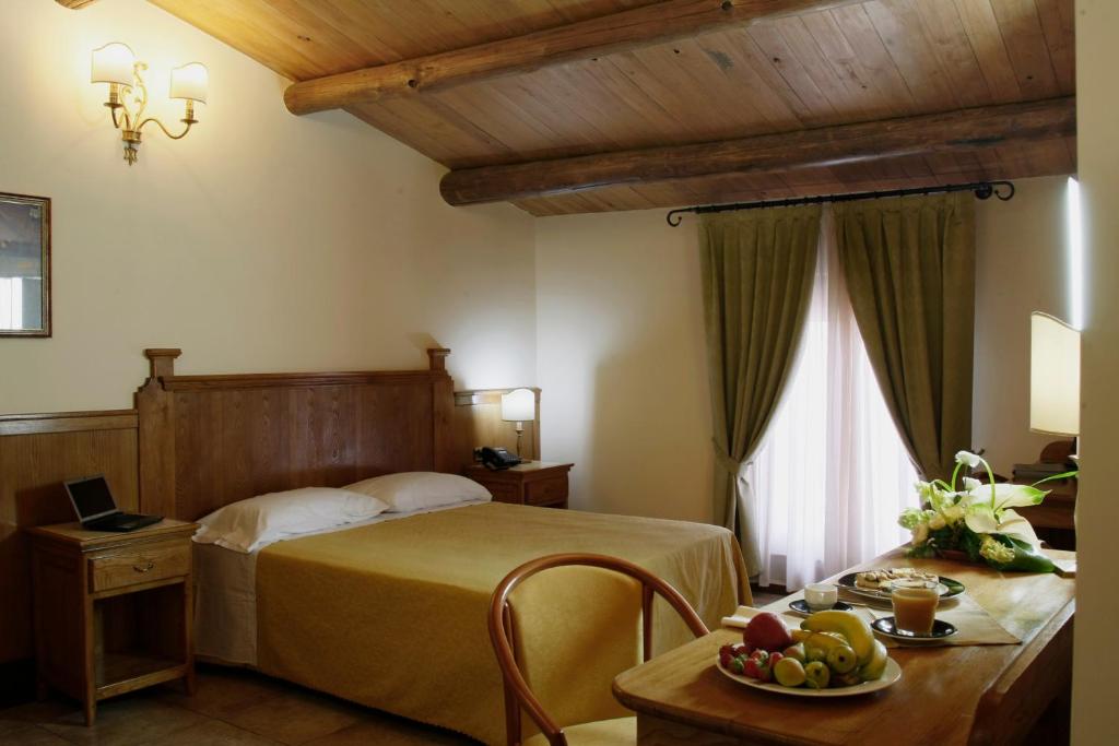 Postel nebo postele na pokoji v ubytování Relais Il Mulino