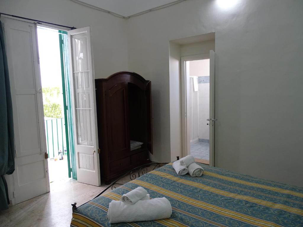 Postel nebo postele na pokoji v ubytování b&b new antico palazzo