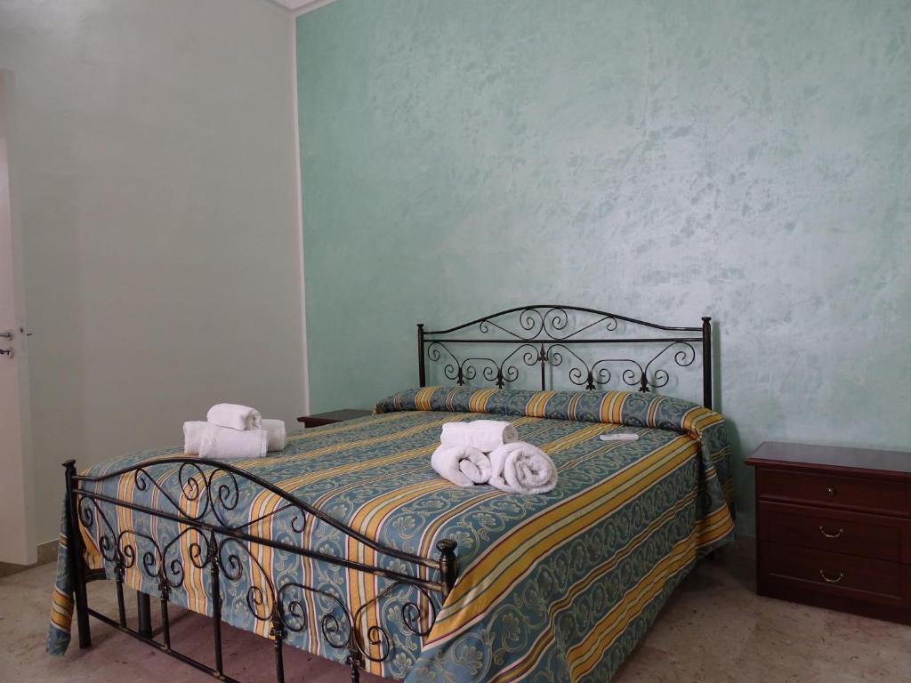 Postel nebo postele na pokoji v ubytování b&b new antico palazzo