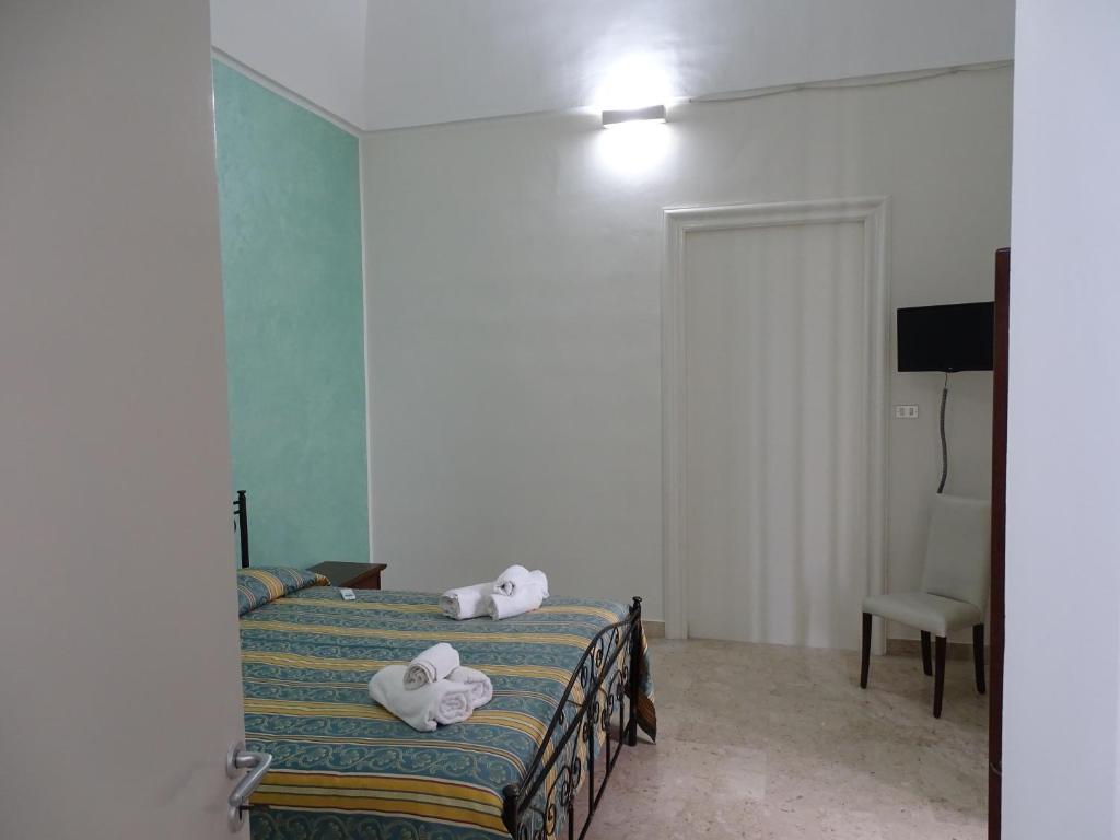 Postel nebo postele na pokoji v ubytování b&b new antico palazzo