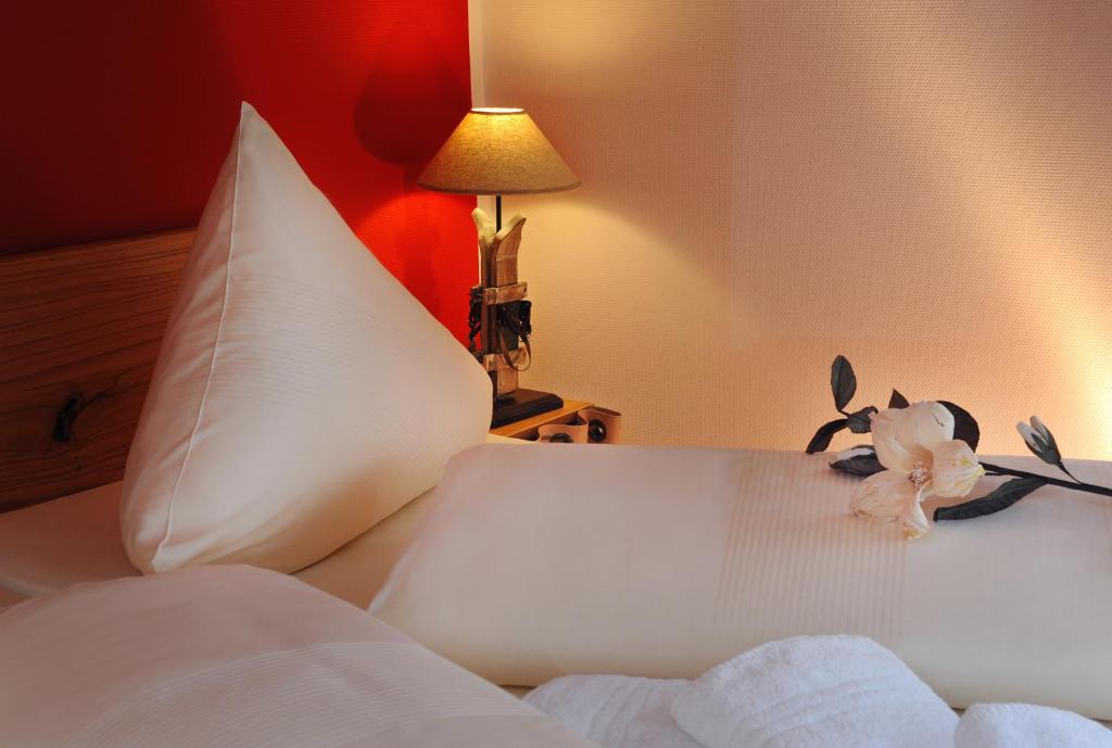 Postel nebo postele na pokoji v ubytování Hotel Goldener Stern