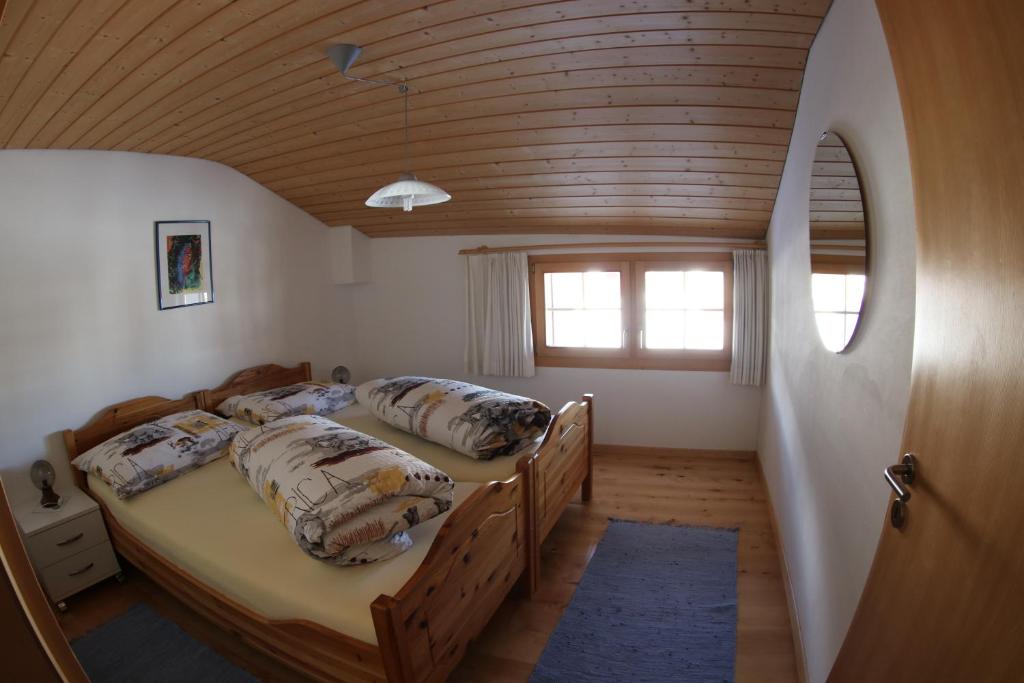 Postel nebo postele na pokoji v ubytování Ferienwohnung Rigoleth