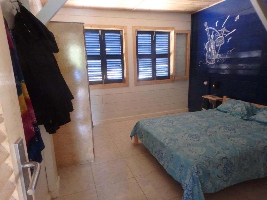 Postel nebo postele na pokoji v ubytování Casa Madeira