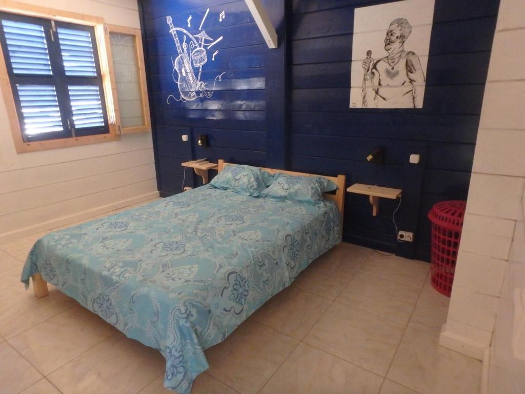 Postel nebo postele na pokoji v ubytování Casa Madeira