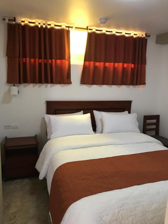 Postel nebo postele na pokoji v ubytování Hotel Seny