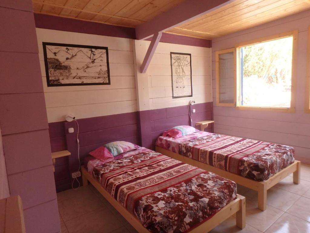 Postel nebo postele na pokoji v ubytování Casa Madeira