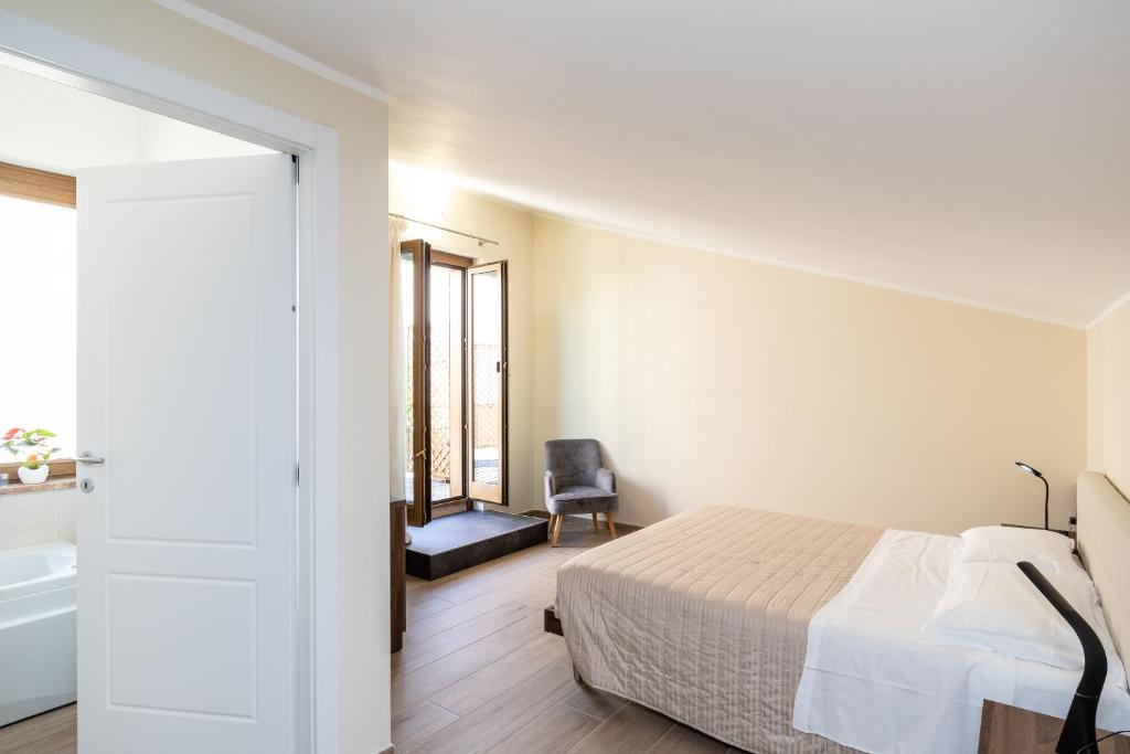 Posteľ alebo postele v izbe v ubytovaní Scaligero Rooms