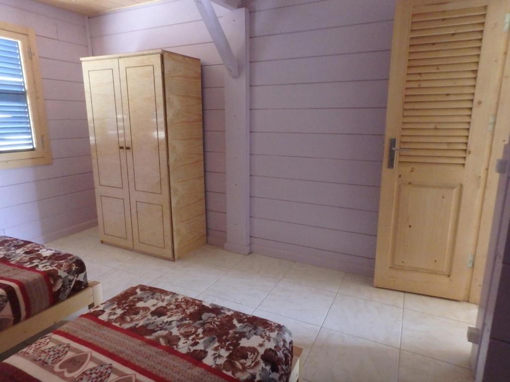 Postel nebo postele na pokoji v ubytování Casa Madeira
