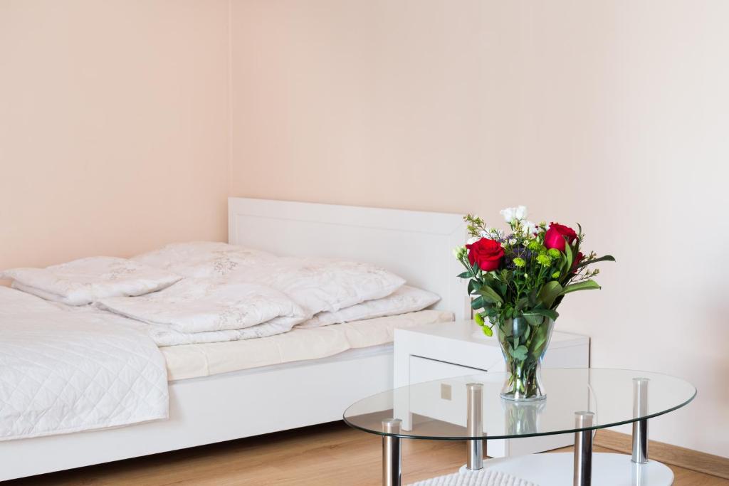 Posteľ alebo postele v izbe v ubytovaní ApartHouse Apartamenty Centrum