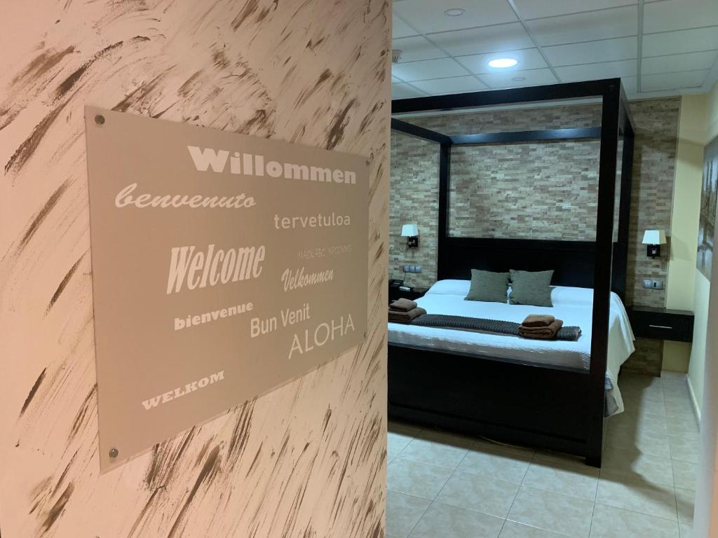 Postel nebo postele na pokoji v ubytování Hotel Don Juan