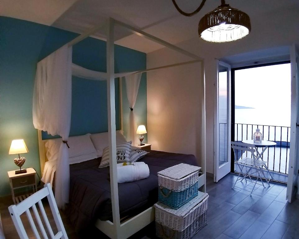 Ένα ή περισσότερα κρεβάτια σε δωμάτιο στο Villa Caruso